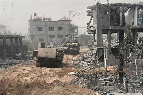 Israel war on Gaza live: Israeli tanks roll into Gaza City .